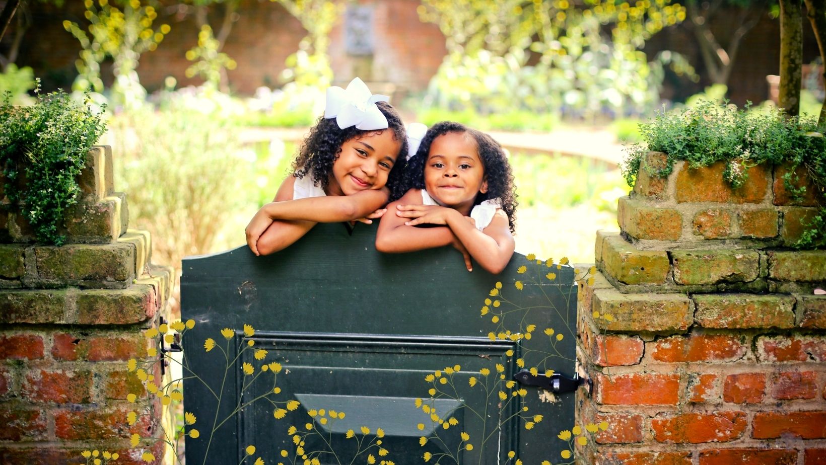 Two little girls posing for a portrait in the Spring in New Orleans