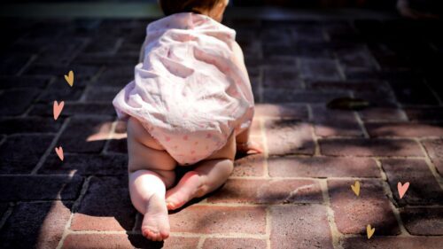 baby crawling at Longue Vue house and gardens during photo shoot