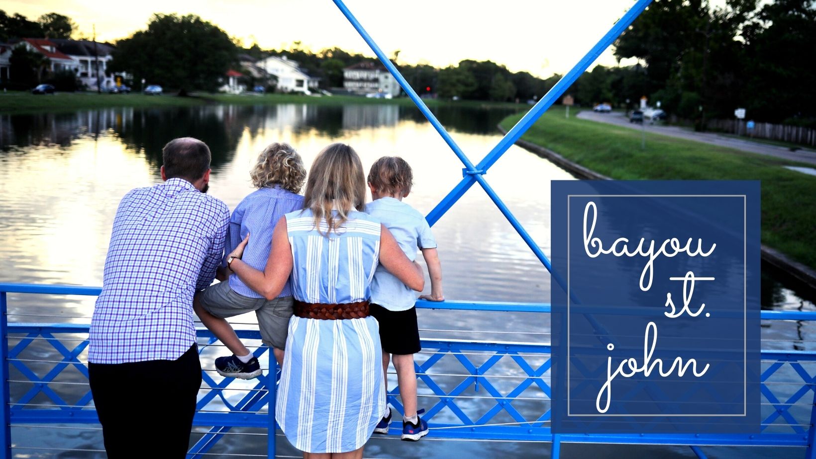 A family looking out at water over Bayou St. John for a location guide story on The Best Photo Locations in New Orleans by Twirl Photography.