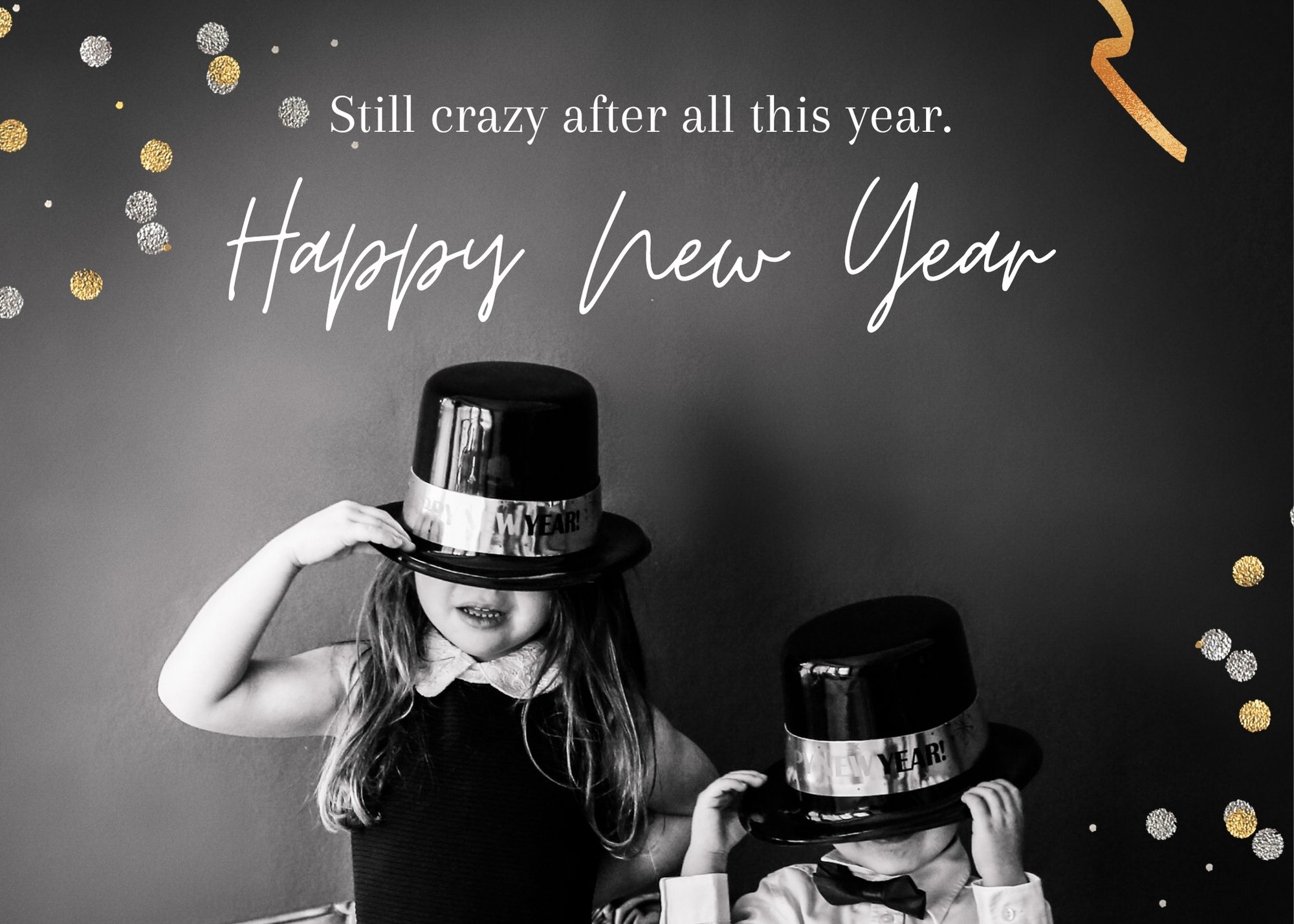 Two kids pulling a top hat over their eyes and smiling with the words Happy New Year on a holiday card for a story about the best places to order your photo holiday cards.