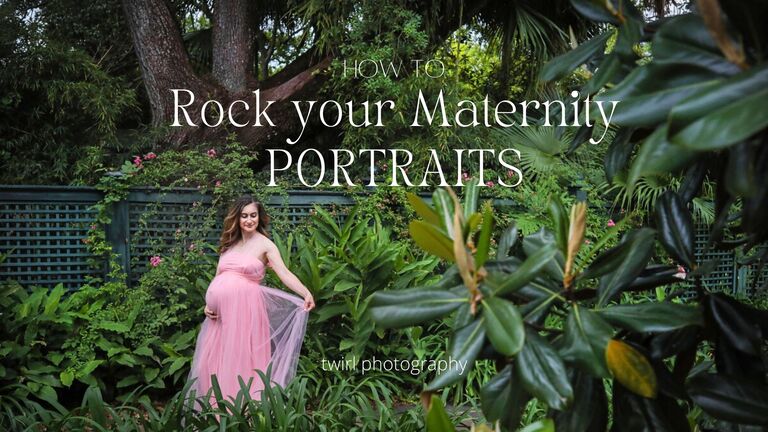 A pregnant woman in a pink maternity dress looking across the lush gardens of Longue Vue gardens in New Orleans.