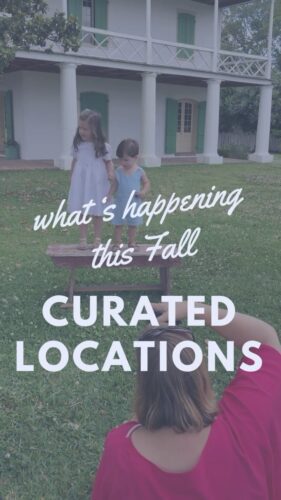 a group of children standing on a bench in front of a building
