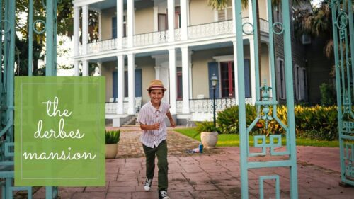 A boy running at the Derbes Mansion in New Orleans.