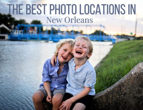 Two young brothers with their arms around each other sitting on the banks of the bayou laughing. Photo for a story about the best photo locations in New Orleans for family photos.