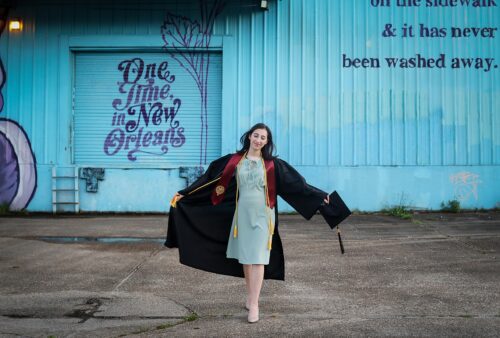 a woman in a graduation gown
