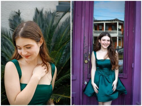 A high school senior in a green dress standing in front of a purple door.