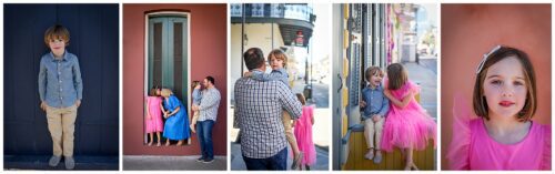 A family posing for portraits in front of brightly colored homes in the French Quarter.