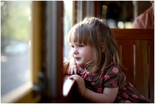 A little girl on a streetcar ride in New Orleans.