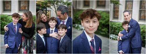 A boy surrounded by his parents and siblings posing in a blue suit for portraits before the start of his bar mitzvah.