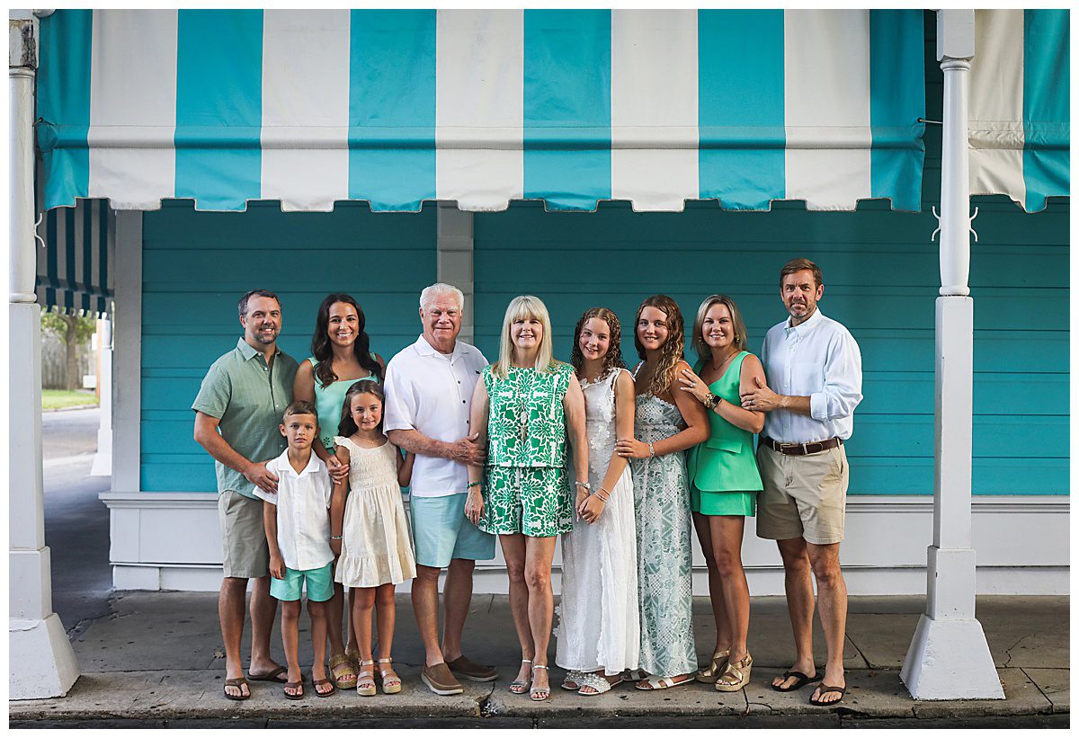 A family of grandparents and adult children with their kids pose for family photos. For a story about when to schedule extended photos.